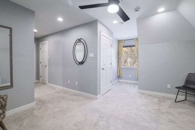 30228 Saint Andrews Dr, Georgetown, TX 78628 - unfurnished bedroom with carpet flooring, a ceiling fan, and a textured wall
