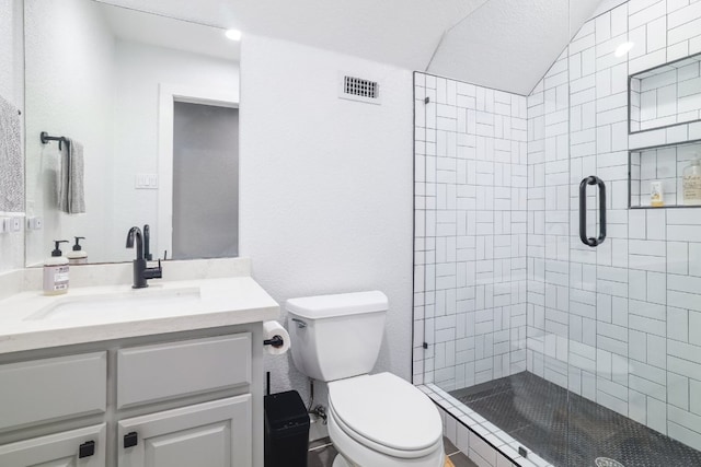 30228 Saint Andrews Dr, Georgetown, TX 78628 - bathroom featuring vaulted ceiling, a shower stall, and vanity