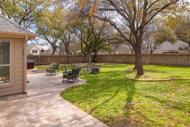 30228 Saint Andrews Dr, Georgetown, TX 78628 - fenced backyard featuring an outdoor fire pit and a patio area