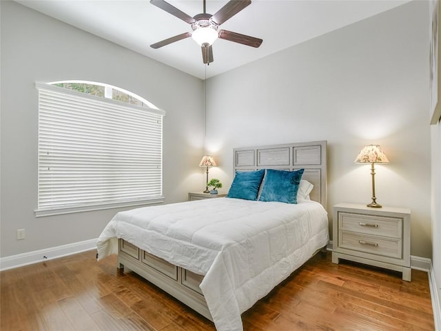 15218 Glen Heather Dr, Lakeway, TX 78734 - bedroom featuring wood finished floors and a ceiling fan