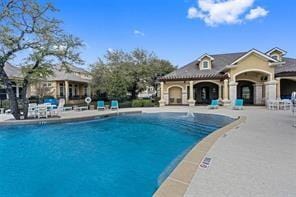 15218 Glen Heather Dr, Lakeway, TX 78734 - community pool with a patio area
