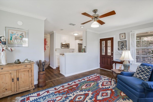 4010 Lewis Ln, Austin, TX 78756 - living room featuring crown molding, a ceiling fan, dark wood-type flooring, and baseboards