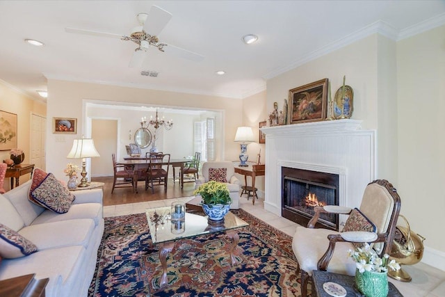 4010 Lewis Ln, Austin, TX 78756 - tiled living area with a fireplace with flush hearth, ornamental molding, a chandelier, ceiling fan, and recessed lighting
