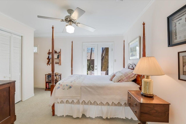4010 Lewis Ln, Austin, TX 78756 - bedroom with french doors, access to exterior, multiple windows, crown molding, and carpet