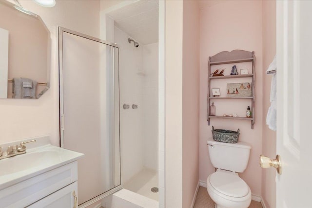 4010 Lewis Ln, Austin, TX 78756 - bathroom featuring a shower stall, vanity, toilet, and baseboards