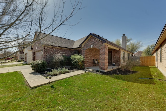 837 Watson Way, Pflugerville, TX 78660 - view of property exterior with brick siding, a chimney, concrete driveway, and a garage