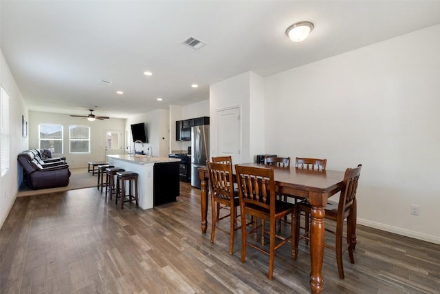 410 Seneca Loop, Kyle, TX 78640 - dining room with dark wood-type flooring, visible vents, a ceiling fan, and recessed lighting