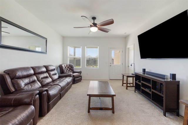 410 Seneca Loop, Kyle, TX 78640 - living area with ceiling fan, light colored carpet, and baseboards