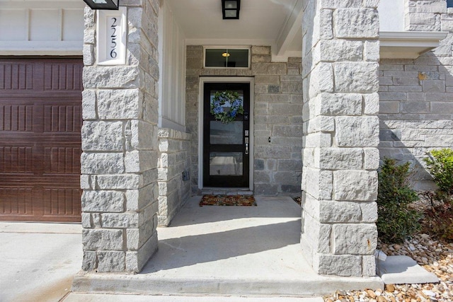 2256 Local Rebel Loop, Leander, TX 78641 - doorway to property with stone siding