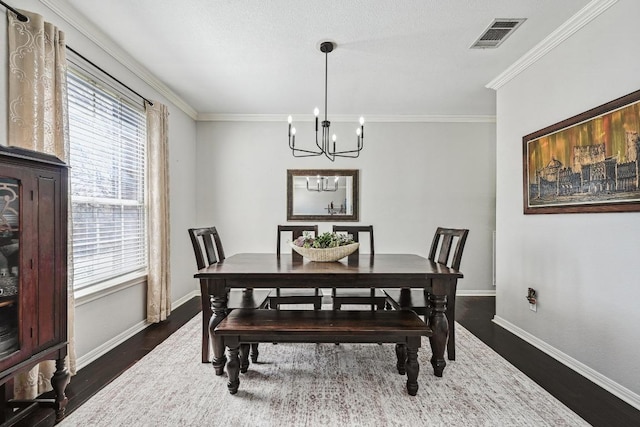 dining area with a notable chandelier, baseboards, visible vents, and dark wood-type flooring
