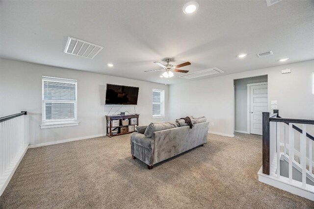 329 Peace Pipe Way, Georgetown, TX 78628 - living room featuring carpet, a ceiling fan, recessed lighting, baseboards, and attic access