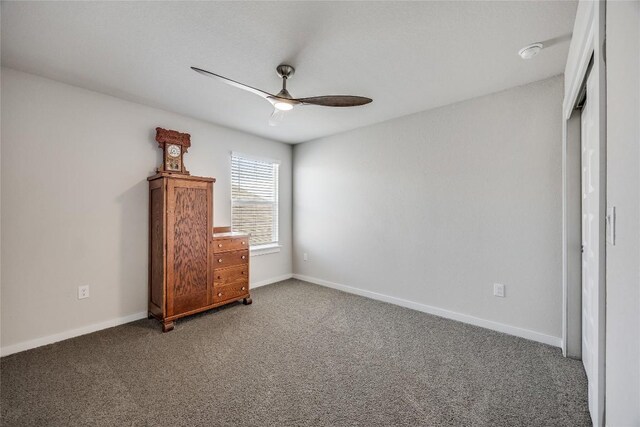 329 Peace Pipe Way, Georgetown, TX 78628 - unfurnished bedroom with carpet flooring, baseboards, and a ceiling fan
