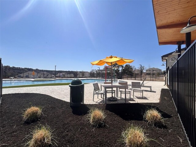 329 Peace Pipe Way, Georgetown, TX 78628 - surrounding community featuring a pool