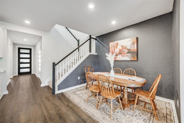 329 Peace Pipe Way, Georgetown, TX 78628 - dining space with stairs, wood finished floors, recessed lighting, baseboards, and a textured wall