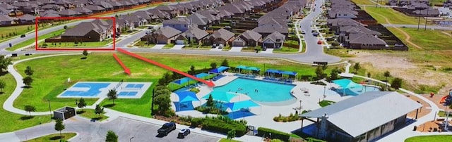 896 Spinnaker Loop, Kyle, TX 78640 - aerial perspective of suburban area with a pool and property boundaries highlighted