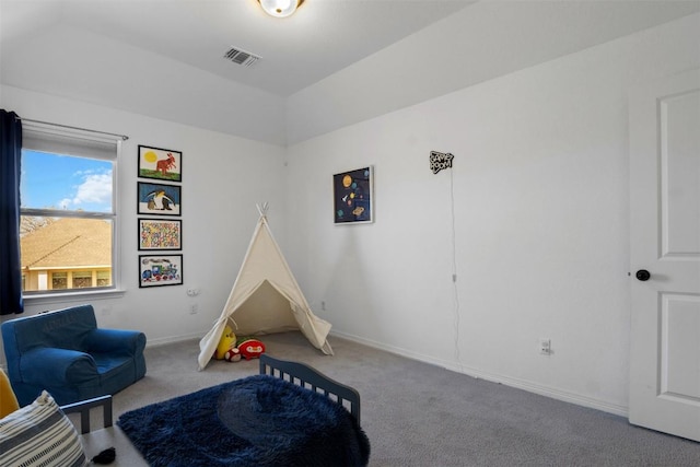 rec room featuring baseboards, carpet, vaulted ceiling, and visible vents