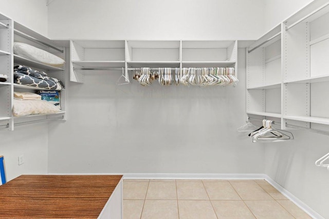 100 Blacksmiths Cir, Georgetown, TX 78633 - walk in closet featuring light tile patterned floors