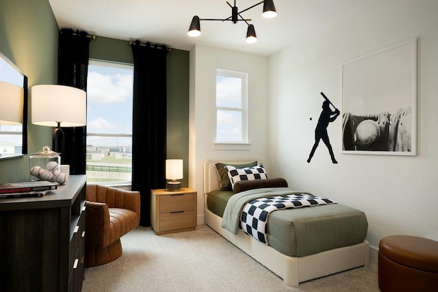 1955 Settlers Glen Dr Unit 4201, Round Rock, TX 78665 - bedroom featuring an inviting chandelier and light carpet