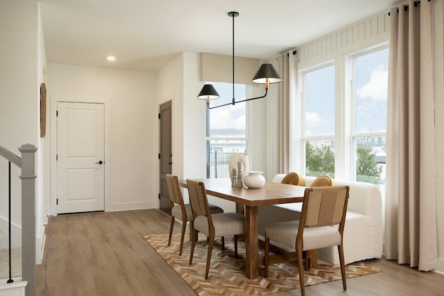 1955 Settlers Glen Dr Unit 4201, Round Rock, TX 78665 - dining space featuring baseboards and light wood-type flooring