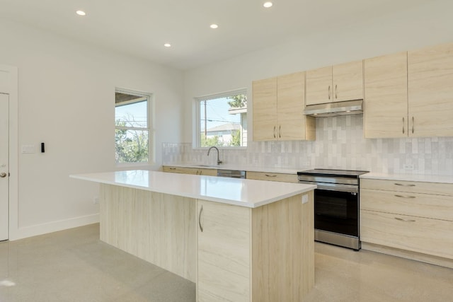 3014 Brass Buttons Trl, Austin, TX 78734 - kitchen featuring stainless steel appliances, light brown cabinetry, under cabinet range hood, decorative backsplash, and light countertops