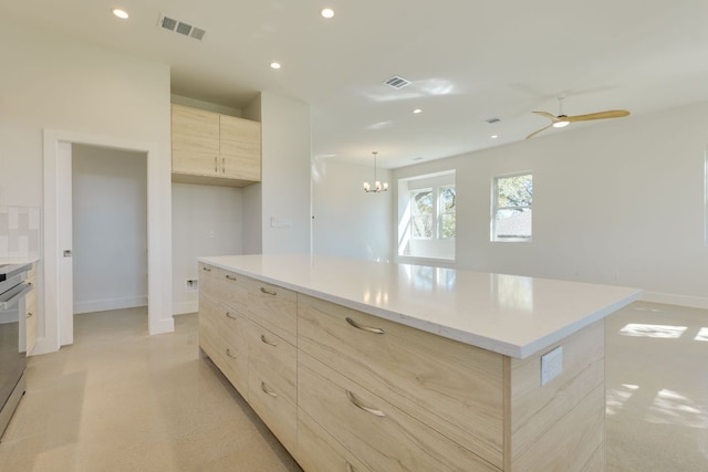 3014 Brass Buttons Trl, Austin, TX 78734 - kitchen with modern cabinets, light brown cabinets, recessed lighting, a spacious island, and a ceiling fan