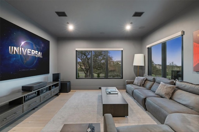 5805 Twin Peaks Trce, Austin, TX 78738 - living room featuring wood finished floors and recessed lighting