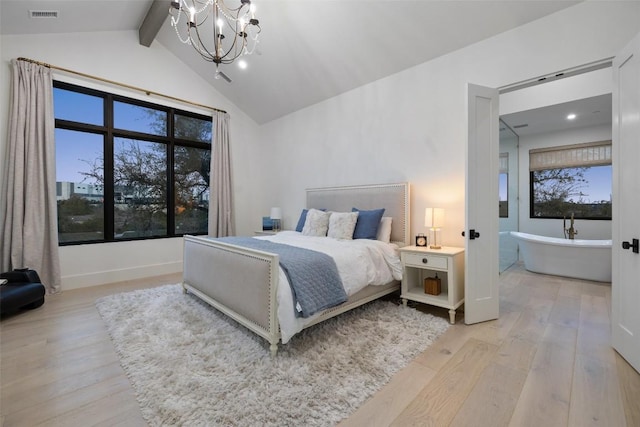 5805 Twin Peaks Trce, Austin, TX 78738 - bedroom with a chandelier and light wood-style floors
