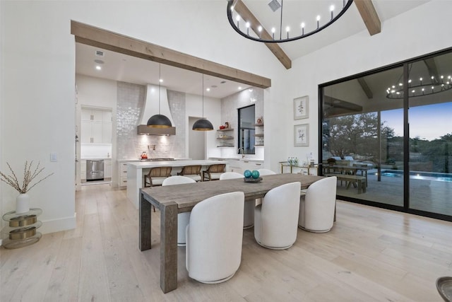 5805 Twin Peaks Trce, Austin, TX 78738 - dining area with light wood-type flooring, a high ceiling, and beamed ceiling