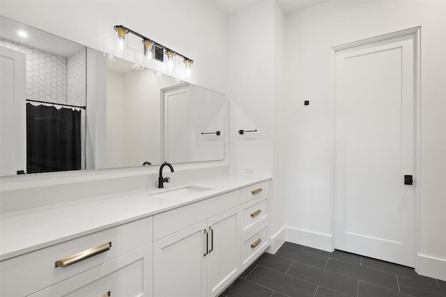 5805 Twin Peaks Trce, Austin, TX 78738 - full bathroom with tile patterned floors, vanity, baseboards, and curtained shower
