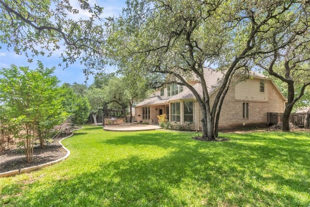 4004 Buckhaven Cv, Cedar Park, TX 78613 - back of house with brick siding and a patio
