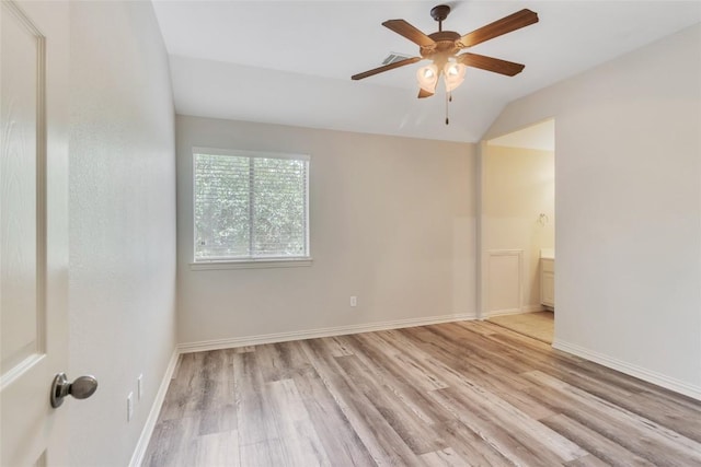 4004 Buckhaven Cv, Cedar Park, TX 78613 - unfurnished room featuring lofted ceiling, light wood-style floors, a ceiling fan, and baseboards