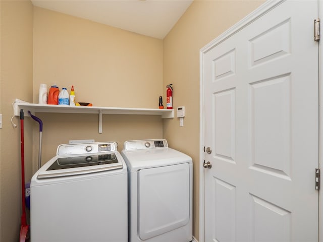 705 Estes Park, Taylor, TX 76574 - washroom featuring washer and dryer