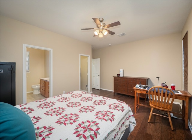 705 Estes Park, Taylor, TX 76574 - bedroom featuring wood finished floors, an office area, and connected bathroom