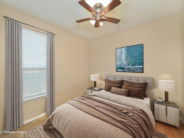 705 Estes Park, Taylor, TX 76574 - bedroom with baseboards and ceiling fan