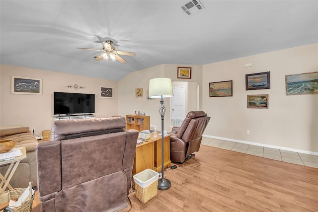 3607 Winding Way, Round Rock, TX 78664 - living room with ceiling fan, light wood-type flooring, vaulted ceiling, and baseboards