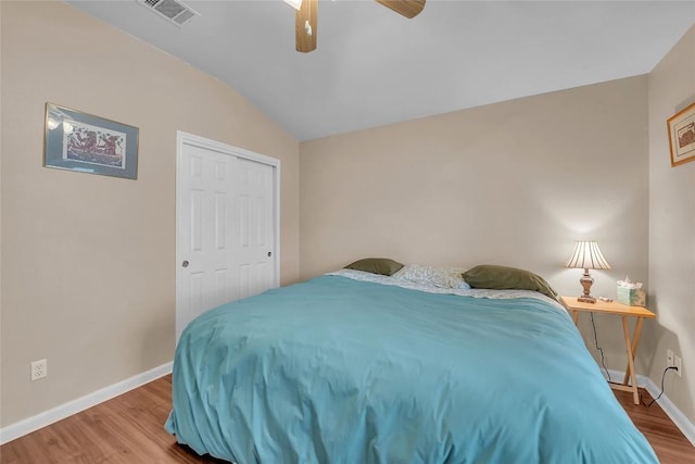3607 Winding Way, Round Rock, TX 78664 - bedroom with vaulted ceiling, wood finished floors, baseboards, a ceiling fan, and a closet
