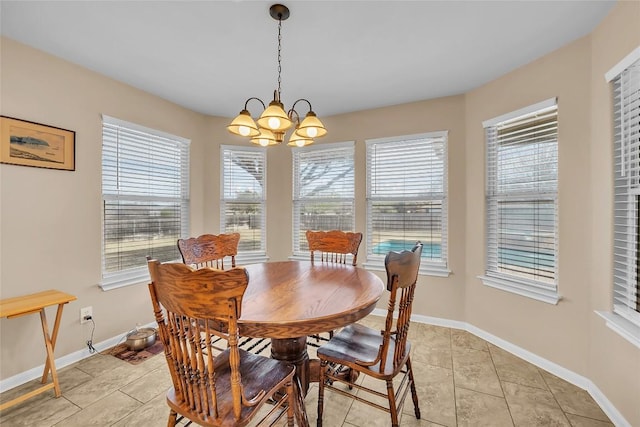 3607 Winding Way, Round Rock, TX 78664 - dining room with a chandelier, baseboards, and light tile patterned flooring