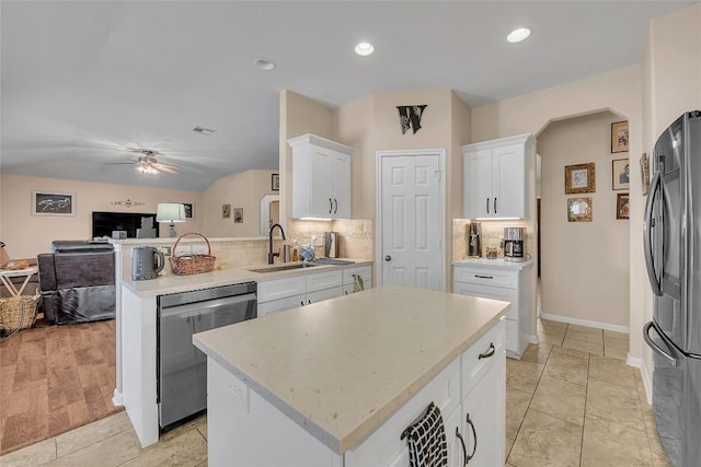 3607 Winding Way, Round Rock, TX 78664 - kitchen featuring stainless steel appliances, a sink, open floor plan, decorative backsplash, and recessed lighting