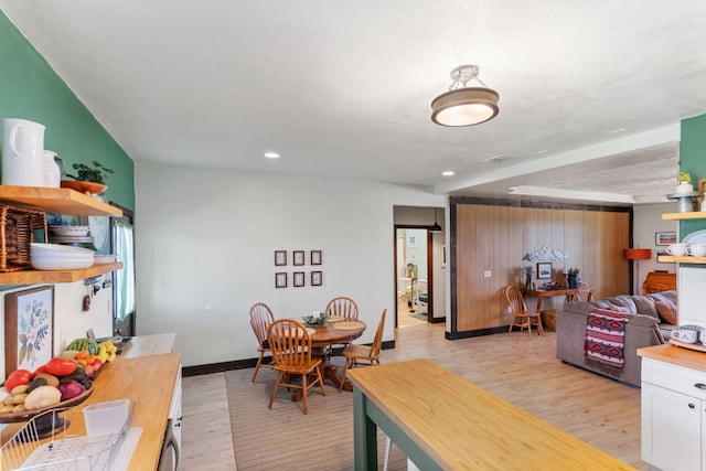 130 Holbox Dr, Del Valle, TX 78617 - dining room featuring light wood finished floors and recessed lighting