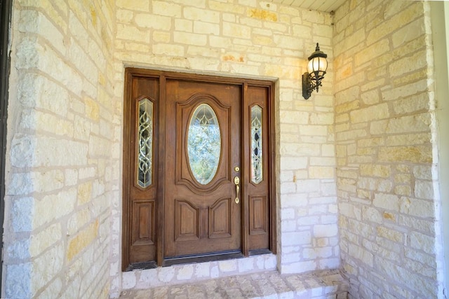 22207 Moulin Dr, Spicewood, TX 78669 - property entrance with covered porch