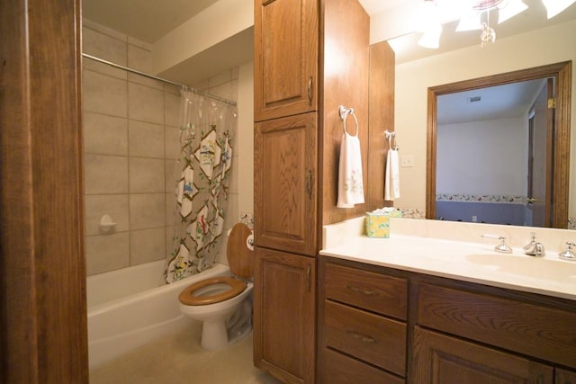 22207 Moulin Dr, Spicewood, TX 78669 - full bathroom with vanity, shower / bath combo with shower curtain, toilet, and visible vents