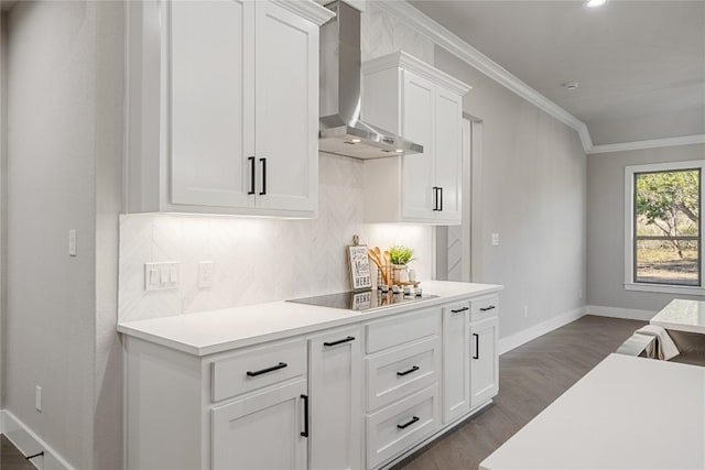 122 Liberty Bell Ln, Fischer, TX 78623 - kitchen featuring wall chimney range hood, baseboards, decorative backsplash, ornamental molding, and light countertops
