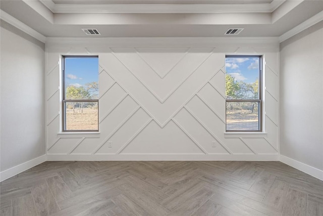 122 Liberty Bell Ln, Fischer, TX 78623 - unfurnished room featuring crown molding, a raised ceiling, baseboards, healthy amount of natural light, and a decorative wall
