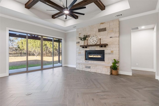 122 Liberty Bell Ln, Fischer, TX 78623 - unfurnished living room featuring baseboards, a stone fireplace, ceiling fan, a tray ceiling, and recessed lighting