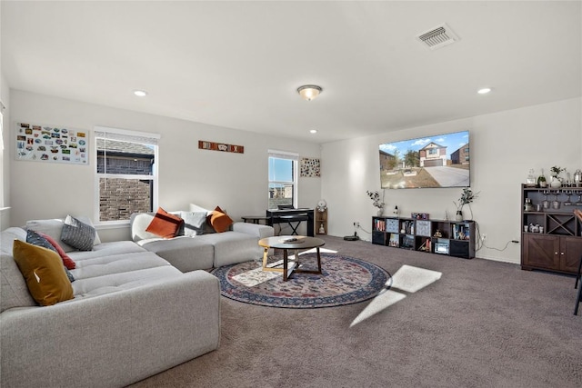 1128 Hemlen Cv, Leander, TX 78641 - carpeted living room featuring recessed lighting