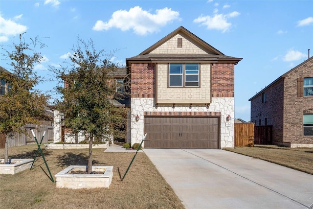 view of front of house featuring a front lawn, stone siding, fence, concrete driveway, and an attached garage