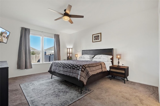 bedroom with baseboards, carpet, and ceiling fan