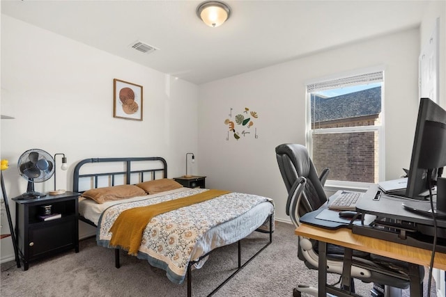 bedroom featuring light carpet and visible vents