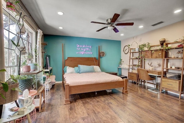 12333 Blue Water Dr, Austin, TX 78758 - bedroom featuring wood finished floors, recessed lighting, a desk, and a ceiling fan