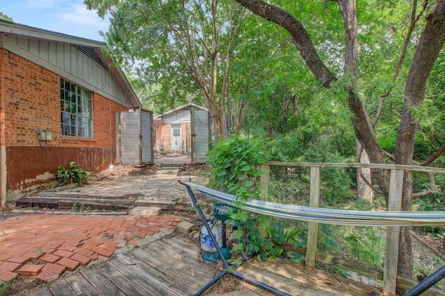 12333 Blue Water Dr, Austin, TX 78758 - wooden terrace featuring a patio area